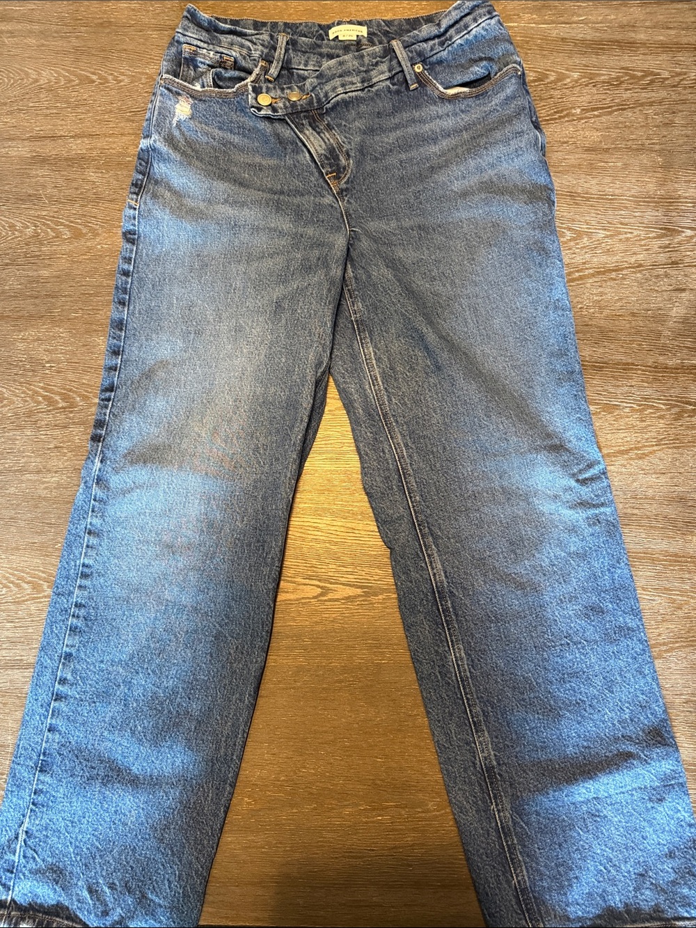 Good American 90’s petite double button crossover waistband Indigo 713